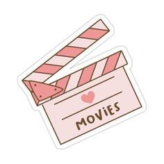 a pink sticker with the words movies written on it and a movie clapper