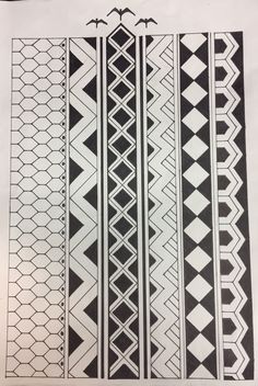 some black and white designs on a piece of paper