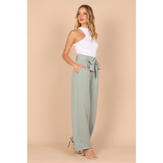 These wide-leg pants are a timeless classic that look as good with a blazer and heels as they do with a casual t-shirt. The high waist and gathered pleated waistband give these trousers an ultra- flattering shape while the functional zip and hook and eye clasp keep your look secure. For added convenience there are belt loops, plus a detachable waist tie to customize your fit. And last but not least, two functional pockets make them practical too! Whether you’re looking for something dressy or ju Chic Wide Leg Dress Pants For Business Casual, Versatile Summer Wide Leg Pants For Formal Occasions, Summer Wide Leg Pants For Business Casual, Chic Wide-leg Dress Pants, Versatile Summer Formal Wide Leg Pants, Wide Leg Pants For Business Casual In Summer, Spring Business Casual High-waisted Wide Leg Pants, Trendy High-waist Wide Leg Pants For Business Casual, Summer Wide Leg Dress Pants For Work