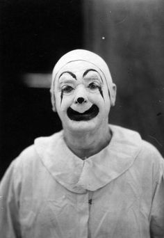 an old photo of a creepy clown