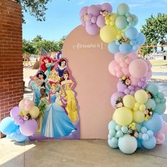 there are balloons and princesses on the side of this arch for a birthday party