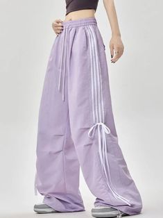 𝔇𝔢𝔱𝔞𝔦𝔩𝔰: Style: Casual, Streetwear, Bloke core Materials: Spandex Quantity: 1 pc These lightweight pants are designed in a pastel color scheme, ideal for the summer season. The ribbon accents add a touch of femininity to this casual piece, perfect for a laid-back yet fashionable outfit. Enjoy free shipping with a purchase of over 80$ SIZE LENGTH WAIST HIPS 39 in 25 in 50 in M 41 in 26 in 51 in L 41 in 27 in 52 in XL 42 in 28 in 53 in Item measured by hands may have 1-2 in differences.SIZE LENGTH WAIST HIPS 102 cm 60 cm 123 cm M 103 cm 64 cm 127 cm L 104 cm 68 cm 131 cm XL 106 cm 72cm 135cm Item measured by hands may have 2-3 cm differences. Trendy Stretch Parachute Pants For Summer, Sporty High Waist Parachute Pants For Spring, Lavender Wide Leg Bottoms For Summer, Casual Lavender Pants For Spring, Sporty Cotton Parachute Pants For Summer, Trendy Cotton Parachute Pants For Summer, Sporty Purple Pants For Spring, Summer Lavender Cotton Pants, Lavender Wide-leg Bottoms For Summer