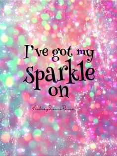 the words i've got my sparkle on are in black and pink with colorful lights