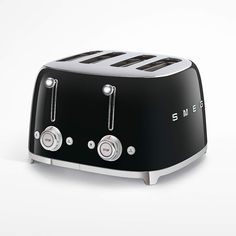 the black toaster has two slices of bread on it