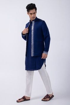 Navy bam silk kurta with mirror embroidered collar and cuffs. Comes with ivory cotton silk pyjama and a linen satin bundi jacket. - Aza Fashions Blue Chanderi Nehru Jacket For Designer Wear, Kurta Set Men, Mirror Embroidery, Nehru Jacket, Silk Kurta, Blue Mirror, Embroidered Collars, Nehru Jackets, Navy Linen