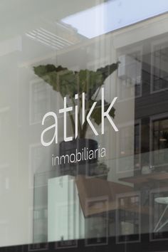 an image of a window with the words atikk in italian and english on it