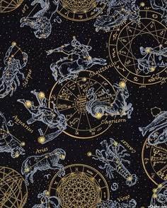 zodiac signs and astro symbols on a black background with gold foiling in the center