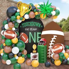 a football themed party with balloons and decorations