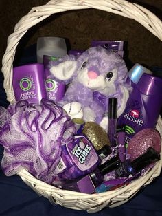 a basket filled with lots of purple items