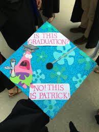 a blue graduation cap that says is this graduation not this is patrick