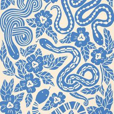 a blue and white print with flowers, snakes and leaves in the center on a cream background