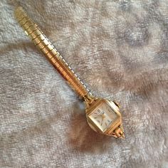 This Ladies 14kt Benrus Swiss Watch Is In Excellent, Working Condition. The Case Is 14kt, The Movement Is 17-Jeweled. The Crystal Has A Slight Surface Scratch Which Can Be Polished Out. The Expandable Watchband Is By Speidel And Will Fit A 7 - 8" Wrist, May Be Shortened By Removing Links As Needed, Or Replaced With Any Band Attached With A C-Clip. Swiss Watch, The Movement, Swiss Watches, Watch Bands, Women Jewelry, Band, Crystals, Women Shopping