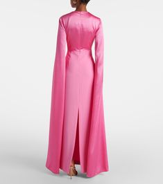 Adley caped crêpe gown in pink - Solace London | Mytheresa Evening Gown With Cape Sleeves And Pre-draped Style, Chic Floor-length Gown With Draped Sleeves, Fitted Pre-draped Evening Dress With Cape Sleeves, Pre-draped Cape Evening Dress, Pink Cape Sleeves Dress For Formal Occasions, Pink Dress With Cape Sleeves For Formal Events, Pink Formal Dress With Cape Sleeves, Floor-length Crepe Maxi Dress For Wedding, Elegant Pink Dress With Cape Sleeves