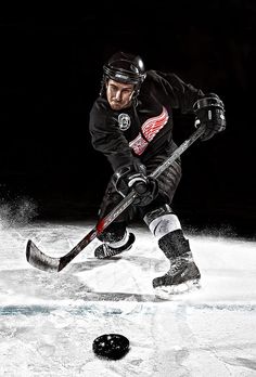 an ice hockey player in action on the ice