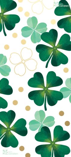 four leaf clovers on white with gold dots