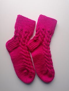 Feet in lenght 22cm 75% acrylic, 25% wool Hand knitted socks with braids. A great choice for a gift or just a small gift for yourself. Hand-knitted soft socks with the optimal feel-good factor for cold winter days. Highly recommend hand washing your wool socks with soap to preserve their color and texture. Ready to Ship Casual Pink Knitted Socks, Casual Knitted Socks For Gifts, Winter Knitted Yarn Socks, Handmade Pink Casual Socks, Hand Knitted Pink Socks For Winter, Hand Knitted Yarn Socks For Winter, Pink Hand Knitted Socks For Winter, Pink Hand-knitted Winter Socks, Casual Hand Knitted Pink Socks