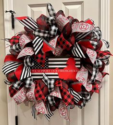 a red and black wreath with the words welcome to firefighter written in white on it