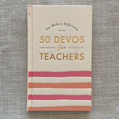 50 devos for teachers book sitting on a table