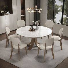 This dining table is an ideal choice for modern families because of its scratch resistant and easy cleaning characteristics of the sintered stone plate, combined with the stable design of multi-layer solid wood board support and solid wood base. It is not only an indispensable piece of furniture in your home, but also a symbol of your quality of life. LABAORRY Size: 29.5"H x 53.1"L x 53.1"W | LABAORRY Modern light luxury simple round dining table sets brownWood in White;gray | 29.5"H x 53.1"L x Simple Round Dining Table, Dining Table Sets, Round Marble Dining Table, Stable Design, Round Dining Table Sets, Round Wood Dining Table, Stone Plate, Stables Design, Table Sets