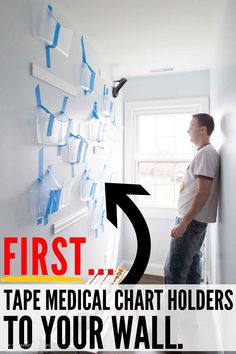 a man standing in front of a wall with tape on it and the words first 5 tape medical chart holders to your wall