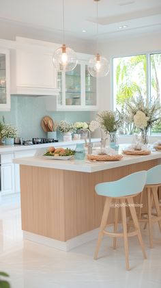 the kitchen is clean and ready to be used as a dining room or breakfast bar