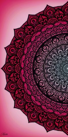 a pink and black circular design on a red background