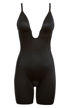 The ultimate low-back, low-front solution for when you’re getting glam, this bodysuit of sleek shaping fabric has adjustable and convertible straps. Control level: medium Includes clear straps and strap converter Adjustable, five-way convertible straps Lightly padded Plunging U-neck accommodates low necklines Low-back design with removable back clasp for versatility Easy Access™ gusset can be pulled to side for easy bathroom breaks Cling-free, single-layer shaping fabric offers lightweight, yet Elegant Fitted Bodysuit With Back Opening, Elegant Second-skin Bodysuit For Evening, Elegant Evening Bodysuit With Second-skin Fit, Elegant Sculpting Backless Shapewear, Elegant Second-skin Bodysuit With High-cut Leg, Elegant Stretch Bodysuit With Back Opening, Elegant Second-skin High-cut Leg Bodysuit, Elegant Low Back Shaping Shapewear, Elegant Low Back Smoothing Shapewear