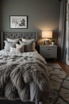 a bedroom with a large bed covered in fur