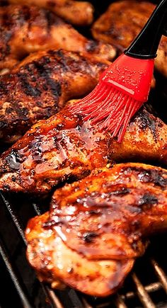 a red brush is sticking out of some meat