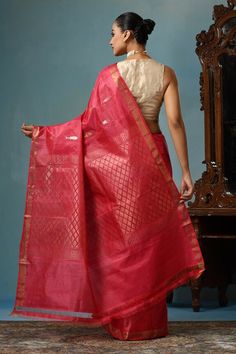 Georgia peach handwoven saree crafted in kosa silk featuring fish motif all over. Comes with a running blouse piece. - Aza Fashions Self Design Pre-draped Saree For Navratri, Cotton Silk Pre-draped Saree For Traditional Ceremonies, Festive Cotton Silk Pre-draped Saree For Traditional Ceremonies, Raw Silk Saree With Woven Motifs For Puja, Puja Saree With Woven Motifs In Raw Silk, Bollywood Style Cotton Silk Dupatta With Woven Motifs, Bollywood Chanderi Saree With Woven Motifs, Traditional Drape Blouse With Woven Motifs, Traditional Ceremonies Woven Motifs Blouse Piece