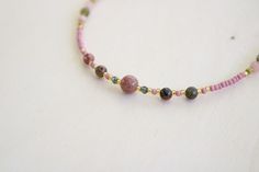 Various Unakite gemstones, pink and green jade, glass crystal beads, with pink and gold glass seed beads. Gold filled claps closure. 12 INCHES Pink Czech Glass Beaded Necklace For Gifts, Pink Natural Stones Beads As Gift, Pink Beaded Czech Glass Necklace, Bohemian Pink Czech Glass Beaded Necklaces, Pink Czech Glass Beaded Bracelets With Colorful Beads, Pink Czech Glass Beaded Bracelet With Colorful Beads, Pink Czech Glass Beaded Bracelets, Glass Seed Beads, Gold Glass