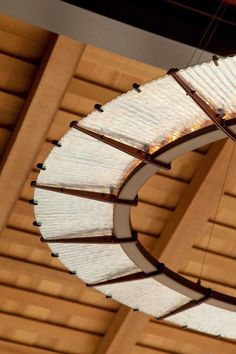 a circular light fixture hanging from the ceiling