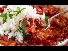 a spoon full of beans and rice with garnish