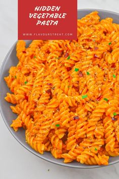 a bowl full of pasta with the words hidden vegetable pasta on top and below it