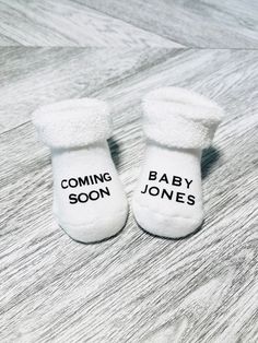 These adorable socks make the perfect baby announcement gift! **Listing is for 1 pair of socks** **Socks do not come pre stuffed** **Font size on socks may very depending on length of name** *Available Sizes:* 0-6 Month, 6-18 Month, 18-36 Month  Want a different saying? Just message for a custom order. ~Care Instructions~ Machine wash in cold water with alike colors, do not bleach, hang to dry or tumble dry on low heat. Cute White Booties For Gift, Cute White Booties As A Gift, Cute White Booties As Gift, Personalized White Socks Gift, Baby Coming Soon, Baby Christmas Gift, Baby Christmas, Baby Coming, Welcome Baby