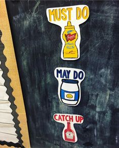 some stickers that are on the side of a blackboard with writing and pictures