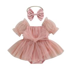 Invest in this timeless Puff Sleeve Baby Girl Romper for your little one. This romper is designed to make your little girl look and feel special. With its beautiful puff sleeve detailing and quality craftsmanship, she can enjoy comfort and style all in one. This charming romper is perfect for your baby girl during any season Crafted from a comfortable blend of cotton and polyester for a soft feel. Features covered buttons for easy on and off, making diaper changes a breeze. A classic solid patte Tulle Tutu Dress, Girls Tulle Dress, Casual Bodysuit, Girl Sleeves, Cotton Blends Dress, Princess Outfits