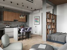 a living room filled with furniture next to a kitchen and dining room table in front of a stove top oven