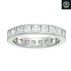 STYLE: This classic bridal ring set is approximately 2.4mm for each band; the engagement ring features a 1 cttw round brilliant cut Infinite Elements Cubic Zirconia centerpiece and half-length inset Zirconia; the eternity wedding band has pave-set Zirconia around the band MATERIAL: Crafted in platinum over 925 sterling silver DETAILS: Hypoallergenic and suitable for sensitive skin, nickel free and lead free CARE: Plated with anti-tarnish coating for a more lustrous appearance and durability; store in a cool, dry place in an air tight container and limit exposure to extreme temperatures, cleaning products, and perfume Luxury Pave Setting Eternity Band For Engagement, Elegant Asscher Cut Eternity Band With Vvs Clarity, Classic Moissanite Ring With Channel Set, Classic Moissanite Channel Set Rings, Classic Bridal Sets With Diamond Center Stone, Classic Diamond Ring With Channel Set, Channel Set Cubic Zirconia Diamond Ring, Classic Diamond White Channel Set Eternity Band, Classic Diamond Ring With Channel Set Round Cut