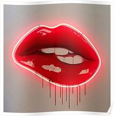 a lit up red lips with dripping blood on it