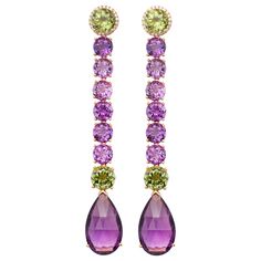 These beautiful long earrings with 47.67ct Amethyst, Peridot, and Diamonds are set in 18kt rose gold. They are a unique piece from our own workshop. The length of the earrings is 8.8cm. The earrings can also be shortened upon request. Diamonds Aesthetic, Pakistani Jewellery, Glamour Nails, Aesthetic Movement, Feminine Tattoos, Chandelier Earrings, Long Earrings, Or Rose, Beautiful Jewelry