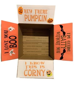 an open box with halloween decorations on it and the words, hey there pumpkin i know this is corny