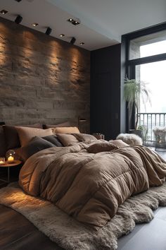 a large bed sitting next to a window in a room with wooden floors and walls