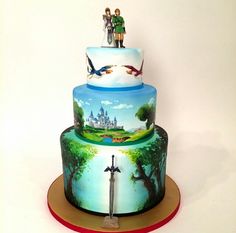 a three tiered cake with an image of people on top