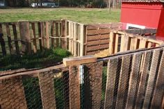 several chicken coops are being constructed in the yard