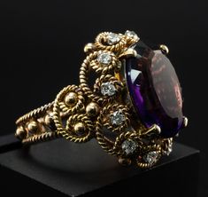 Buy Purple Amethyst Diamond Ring, Vintage 14K Gold Oval Cocktail Online in India - Etsy Elegant Gold Amethyst Ring With Intricate Design, Oval Amethyst Ring With Diamond Accents In Yellow Gold, Oval Amethyst Ring In Yellow Gold With Diamond Accents, Vintage Diamond Amethyst Ring For Formal Occasions, Elegant 14k Gold Amethyst Ring Collectible, Luxury Oval Amethyst Collectible Ring, Vintage Amethyst Ring With Diamond In Yellow Gold, Vintage Gold Amethyst Ring With Diamond, Vintage Yellow Gold Amethyst Ring With Diamond