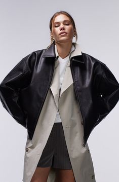 Sleek style is easy in this textured faux-leather bomber jacket that's an excellent layer for bringing a little edge to your look. 26" length (size Medium) Front button closure Spread collar Side-seam pockets Lined 100% polyurethane Machine wash, dry flat Imported Black Leather Cropped Jacket With Zipper, Sleek Fall Outerwear With Zip Fly, Sleek Outerwear For Layering In Fall, Sleek Outerwear For Fall Layering, Sleek Fall Outerwear For Layering, Chic Leather Outerwear For Layering, Fall Leather Cropped Jacket For Streetwear, Black Leather Cropped Jacket For Fall, Faux Leather Jacket With Zipper For Work