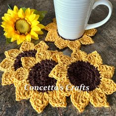 three crocheted sunflower coasters with a coffee cup on the ground next to them