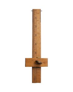 a wooden ruler with a piece of wood sticking out of it's side on a white background