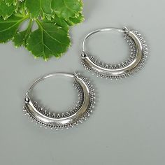 IMPORTANT **Please go through all the pictures i have posted for a listing with a ruler, on a model, on my hand, to get an exact idea of the actual size of the item. Tibetan style sterling silver chunky hoops. Dimensions: 22 x 25 mm Price is for ONE PAIR. These earrings are made of 925 hypoallergenic sterling silver. Most of my pieces come with a 925 stamp. Can be packaged in a gift box. I can include a personal message from you if needed You are welcome to contact me at... bhavnakwintra1956@gma Bohemian Silver Hoop Earrings For Festivals, Silver Hoop Earrings With Ear Wire For Festivals, Bohemian Sterling Silver Hoop Earrings, Bohemian Silver Hoop Earrings, Sterling Silver Dangle Hoop Earrings For Festivals, Bohemian Sterling Silver Pierced Hoop Earrings, Small Hoop Sterling Silver Earrings For Festival, Silver Bohemian Hoop Earrings With Oxidized Finish, Silver Bohemian Hoop Earrings For Festivals